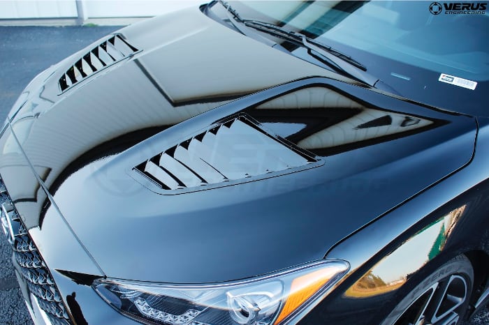 Black Hyundai Veloster with aftermarket hood louvers