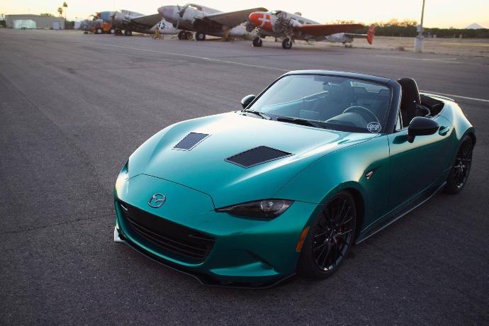 green Mazda with hood louvers