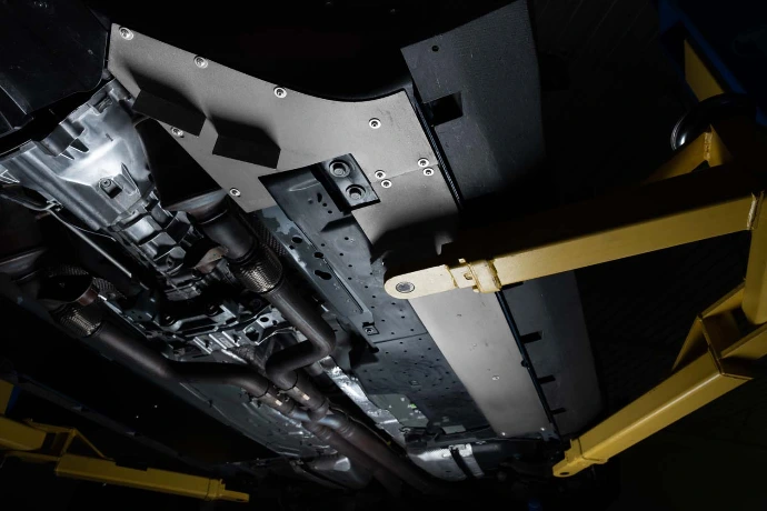 Close-up of the Verus Flat Underbody Panel Kit fitted to the underbody of a Ford Mustang Shelby GT350