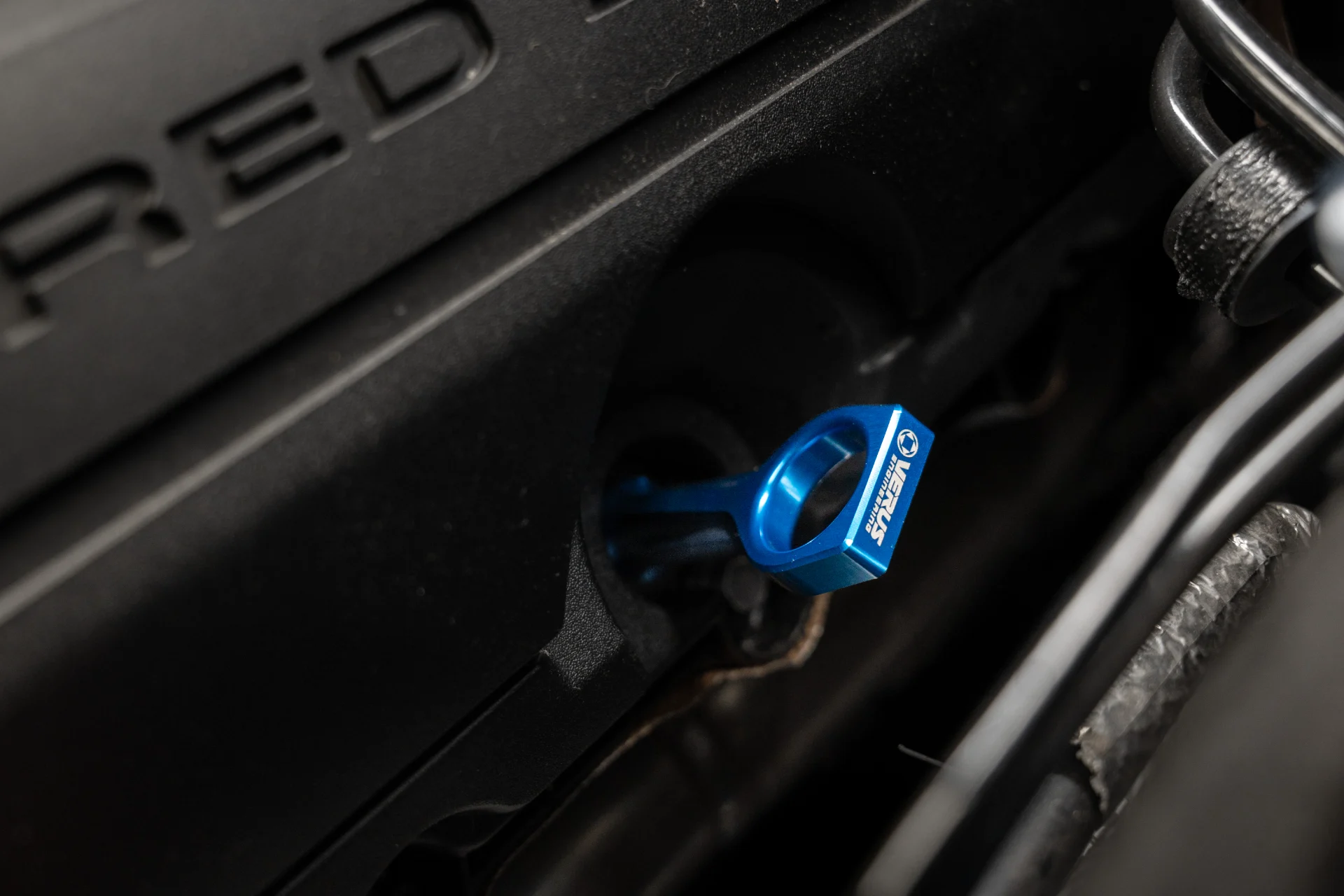Verus dipstick handle installed in the engine bay