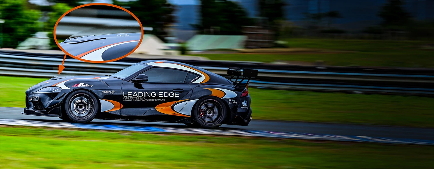 Mk5 Toyota Supra on track with carbon hood louver